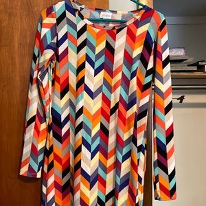 Long sleeve fitted body dress.